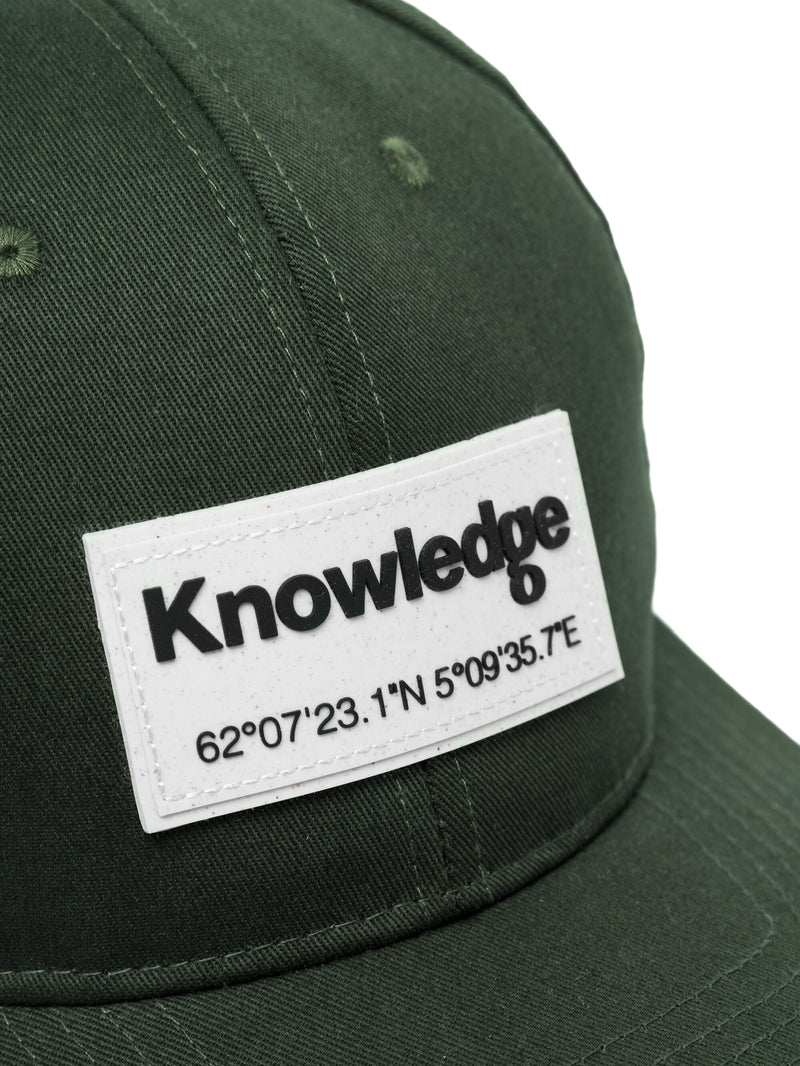 KnowledgeCotton Apparel - UNI Twill baseball cap with siliconebadge Caps 1090 Forrest Night